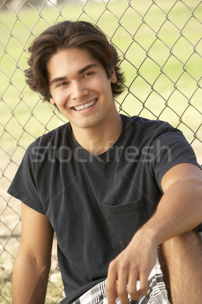 Teenager Sitzung Spielplatz Mann glücklich teen Stock foto © monkey_business
