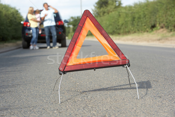Family Broken Down On Country Road With Hazard Warning Sign In F Stock photo © monkey_business
