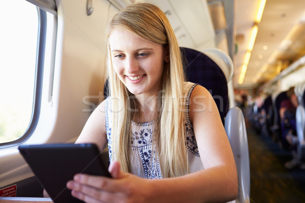 Stock fotó: Tinilány · digitális · tabletta · vonat · utazás · technológia