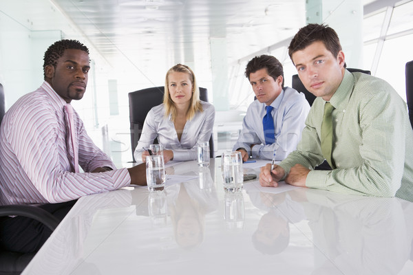 Quatro sala de reuniões pessoas de negócios trabalhando equipe Foto stock © monkey_business