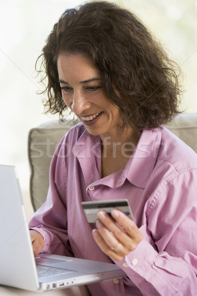 Stock photo: Woman making online purchase