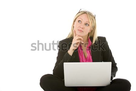 Сток-фото: деловая · женщина · сидят · ноутбука · мышления · костюм · связи