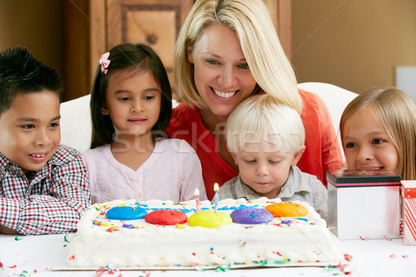 Mother Celebrating Child's Birthday With Friends Stock photo © monkey_business