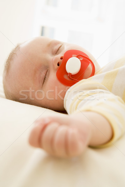 Baby lying indoors sleeping Stock photo © monkey_business