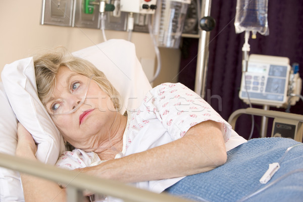 Stock photo: Senior Woman Lying In Hospital Bed