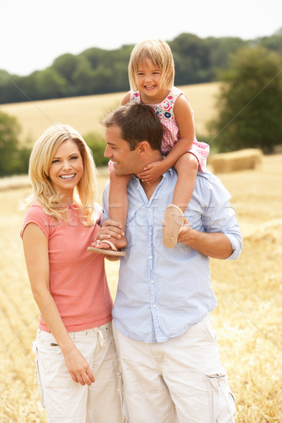 Family Walking Together Through Summer Harvested Field Stock photo © monkey_business