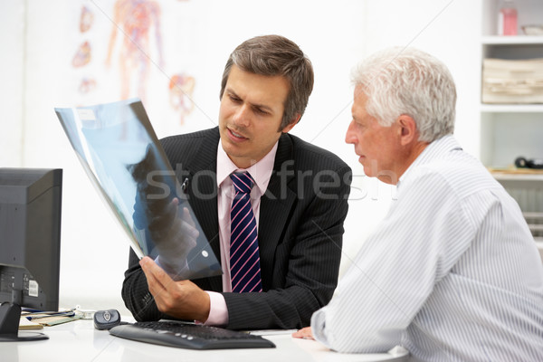 Doctor with senior patient Stock photo © monkey_business