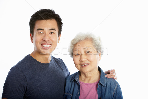 Studio Portrait Of Chinese Mother With Adult Son Stock photo © monkey_business