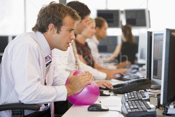 Businessman in office space with a ball Stock photo © monkey_business