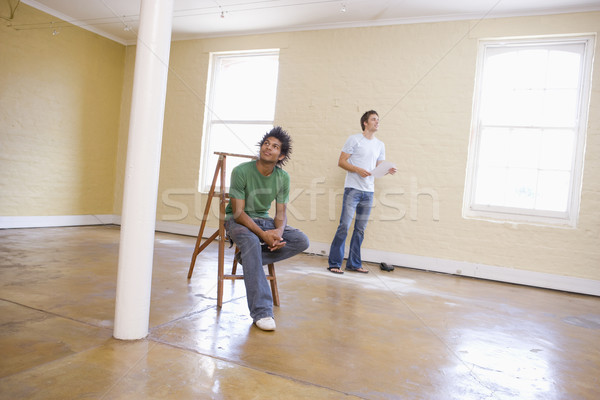 Dos hombres escalera papel oficina Foto stock © monkey_business