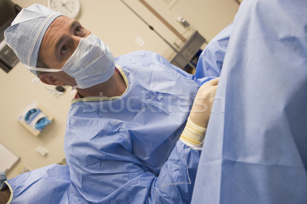 врач яйцо процедура театра цвета мужчины Сток-фото © monkey_business