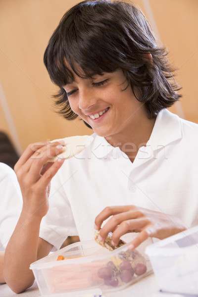 Schooljongen genieten lunch school cafetaria kind Stockfoto © monkey_business