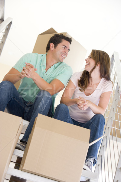 пару сидят лестница коробки новый дом улыбаясь Сток-фото © monkey_business