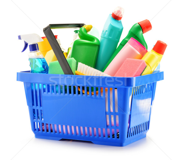 Shopping basket with detergent bottles isolated on white Stock photo © monticelllo