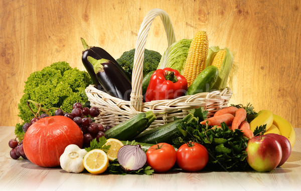 Fruits and vegetables in wicker basket Stock photo © monticelllo
