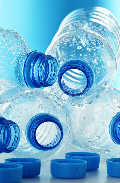 Stock photo: Composition with empty polycarbonate plastic bottles of mineral 