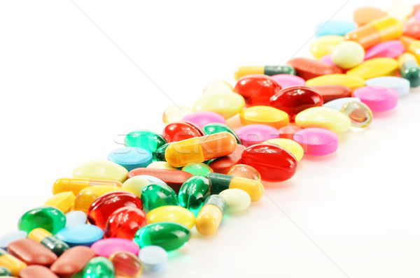 Composition with dietary supplement capsules and drug pills Stock photo © monticelllo
