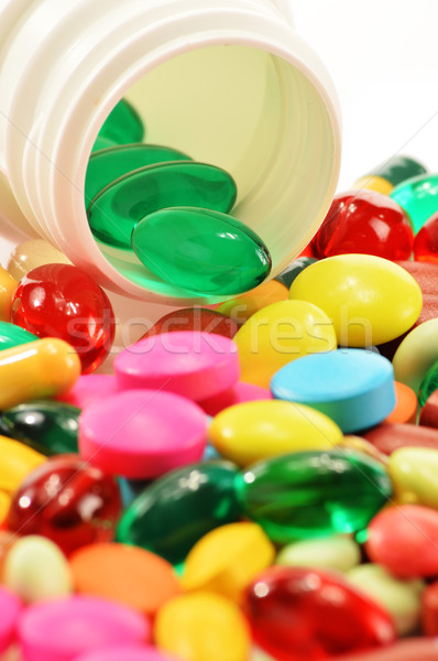 Composition with dietary supplement capsules and drug pills Stock photo © monticelllo