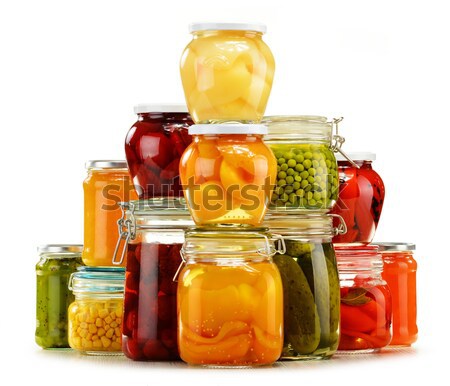 Composition with jars of pickled vegetables. Marinated food. Stock photo © monticelllo