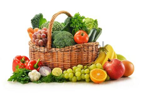 Fruits and vegetables in wicker basket Stock photo © monticelllo