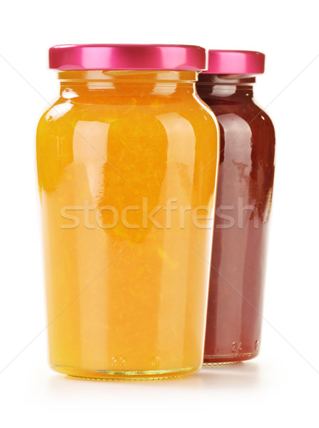 Two jars of fruity jams isolated on white. Preserved fruits Stock photo © monticelllo