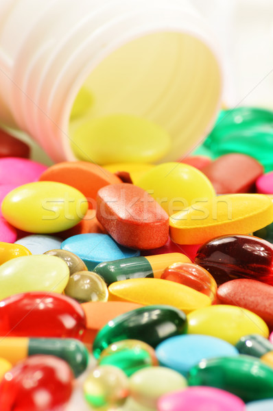 Composition with dietary supplement capsules and drug pills Stock photo © monticelllo