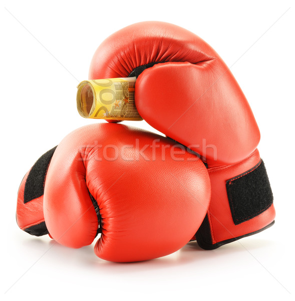 Pair of red leather boxing gloves and euro banknotes on white Stock photo © monticelllo
