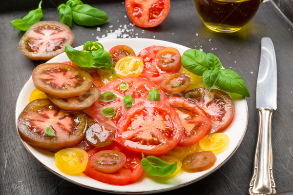 Colorido tomates salada manjericão verde amarelo Foto stock © Moradoheath