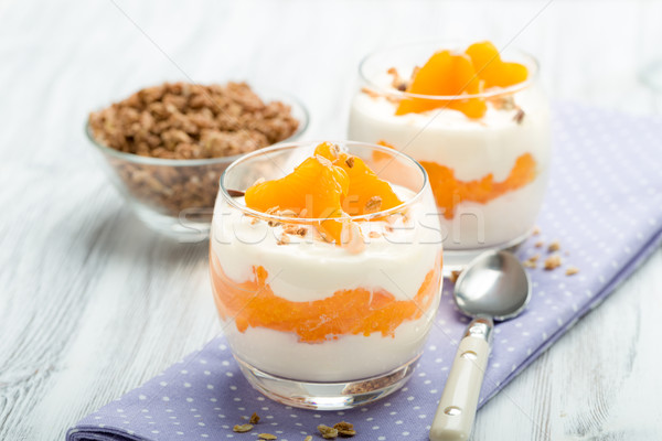 Iogurte mandarim laranjas granola fruto vidro Foto stock © Moradoheath