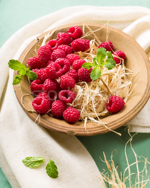 Raspberries in a bowl Stock photo © Moradoheath