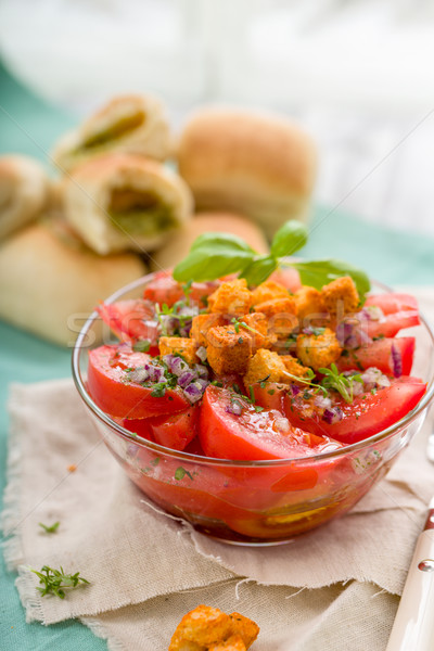 Tomato salad with herbs and croutons Stock photo © Moradoheath