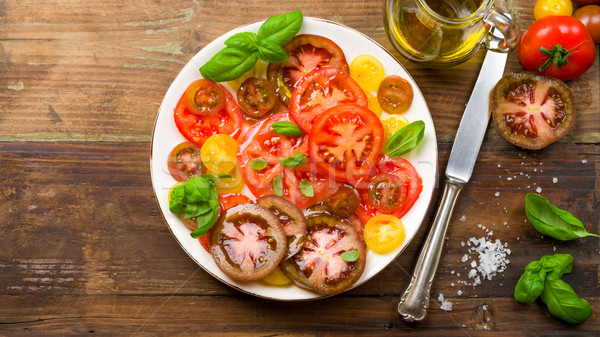 Colorful Tomato Salad with Basil Stock photo © Moradoheath