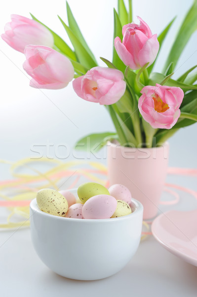 Easter decoration with painted eggs and beautiful pink tulips Stock photo © Moravska