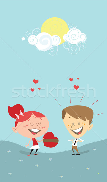 Valentine's heart gift, girl giving a gift to a boy Stock photo © Morphart