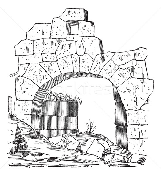 Construction of a fortification door made of stone, Masonry arch Stock photo © Morphart