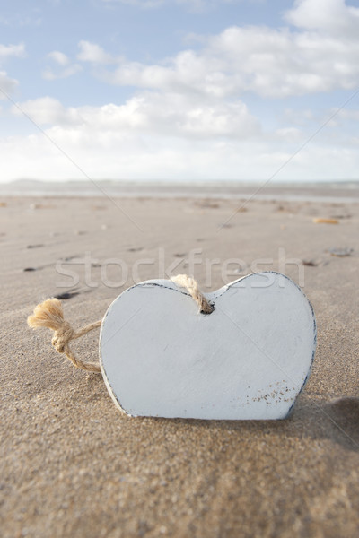alone wooden love heart in the sand Stock photo © morrbyte