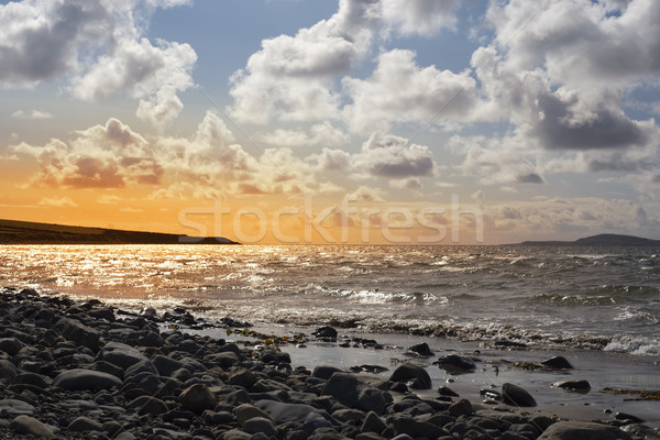 Belo pôr do sol praia céu água Foto stock © morrbyte