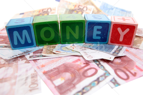 money in toy play block letters Stock photo © morrbyte