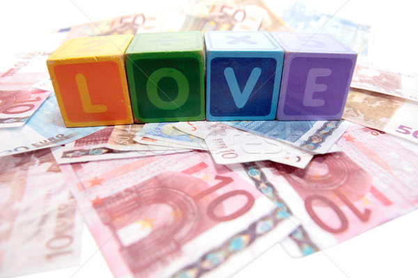 love in toy play block letters with cash Stock photo © morrbyte