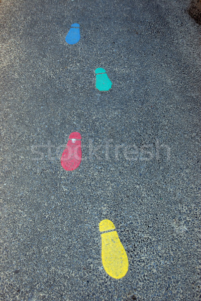 color footprints in school playground Stock photo © morrbyte