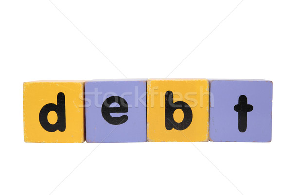 debt in toy play block letters with clipping path on white Stock photo © morrbyte