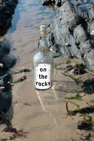 Süllyed kövek üveg üzenet áll tengerpart Stock fotó © morrbyte