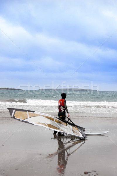 lone Atlantic way windsurfer getting ready to surf Stock photo © morrbyte