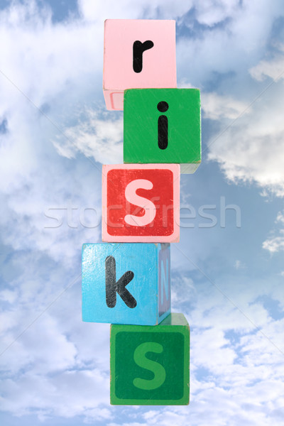 cloudy risks in toy play block letters with clipping path Stock photo © morrbyte