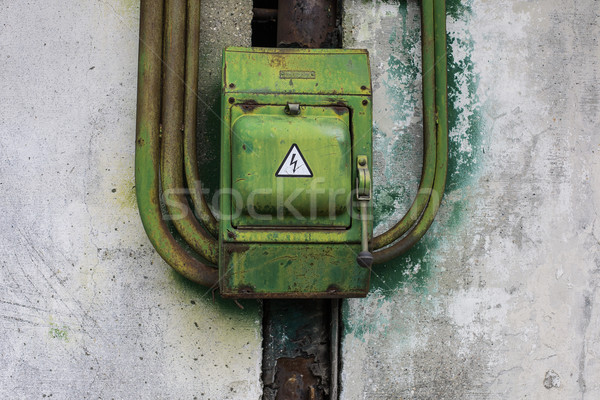 old green rusty metal switch on beton wall Stock photo © motttive