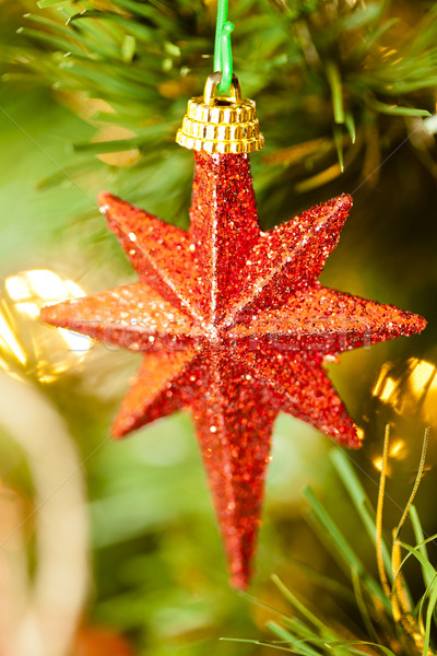 Noel star dekorasyon süslemeleri asılı noel ağacı Stok fotoğraf © mpessaris