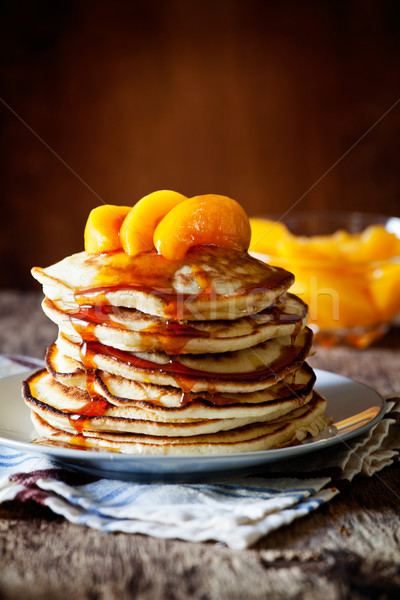 Pannenkoeken perziken honing eigengemaakt voedsel Stockfoto © mpessaris