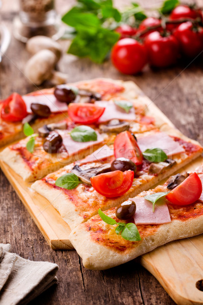 Stock photo: Sliced Pizza