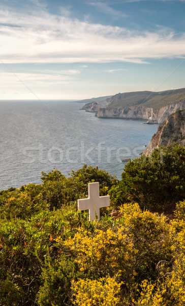 White cross on a seaside cliff Stock photo © Mps197