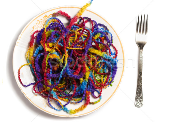 Full plate of melange yarn with a fork Stock photo © mrakor